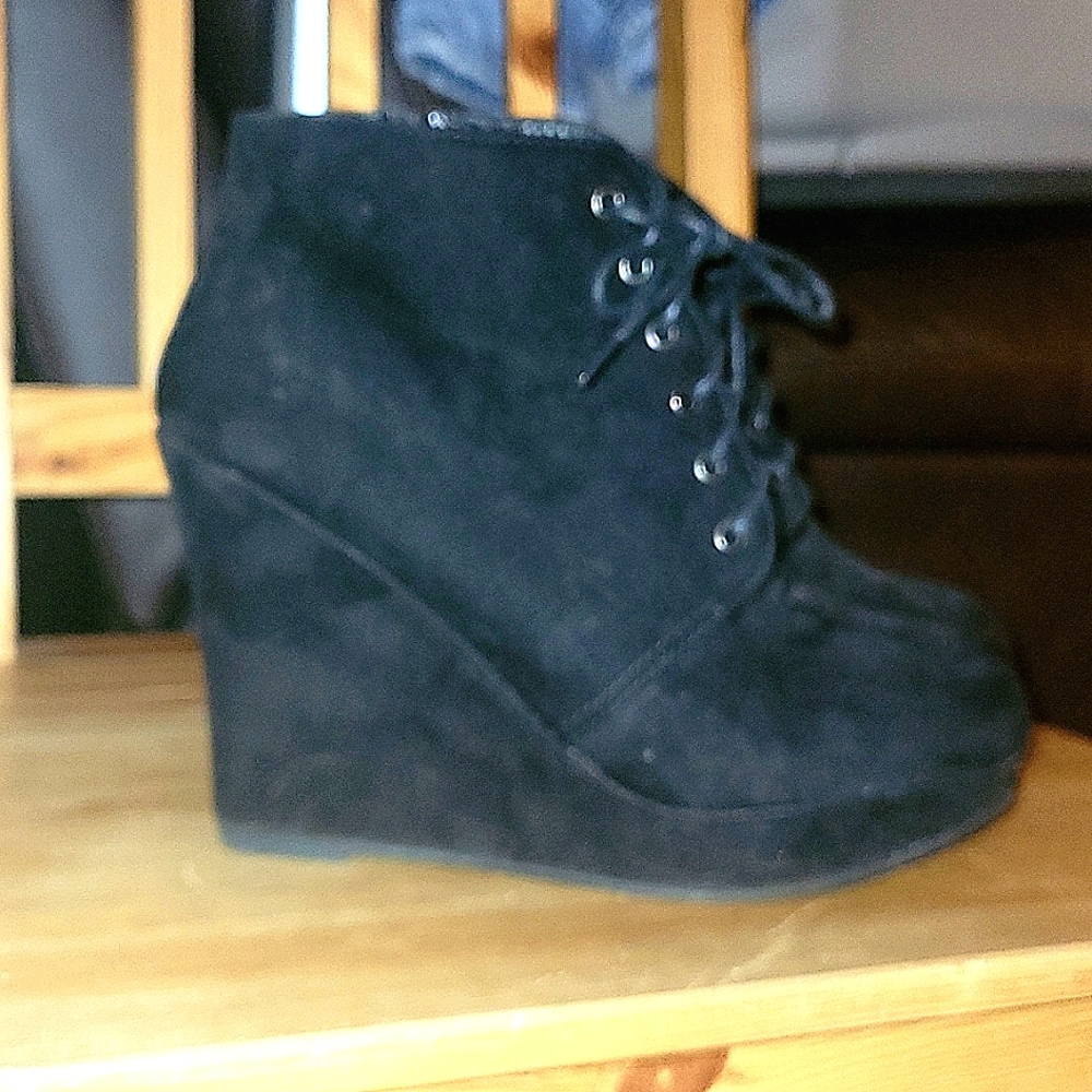 Really sweet lace-up, black wedged heel ankle boot.